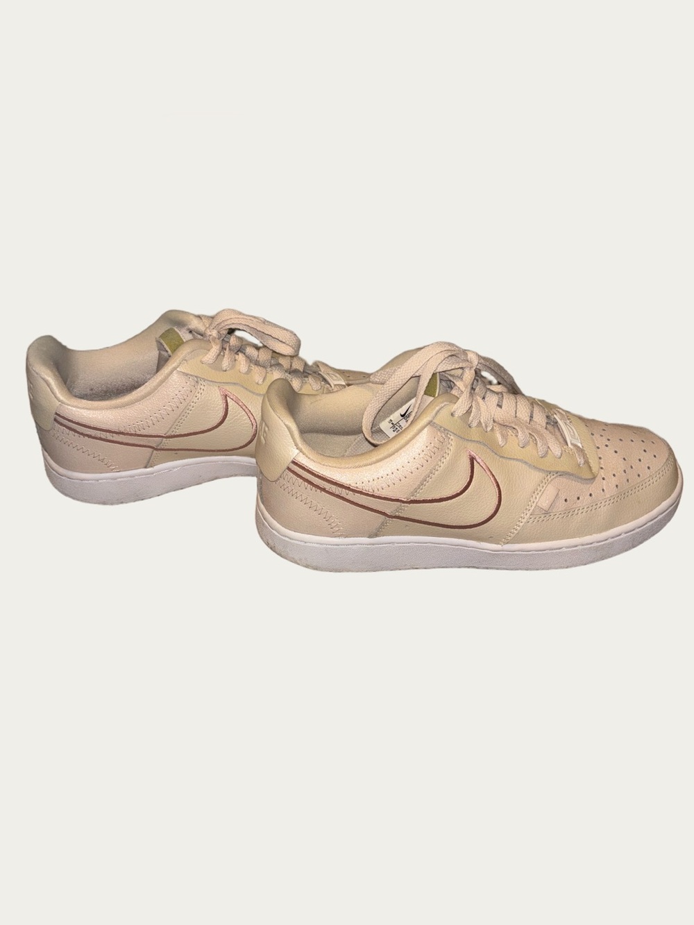 Nike Women’s Low-Top Sneakers in Shimmery Cream with Maroon Swoosh